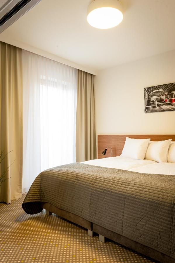 Aparthotel Invite à Wrocław Chambre photo