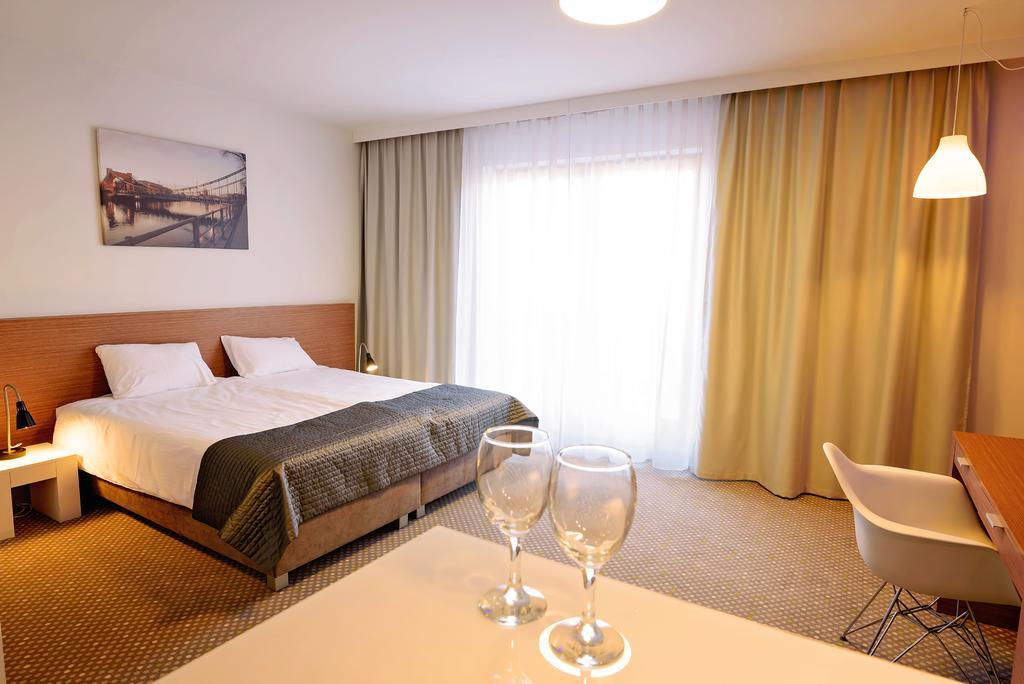 Aparthotel Invite à Wrocław Chambre photo